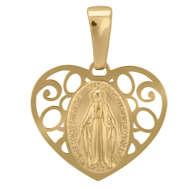 Złoty medalik w kształcie serca.