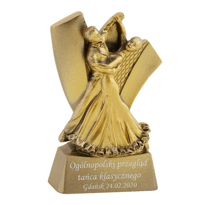 Statuetka w kolorze złotym przedstawiająca tańczącą parę 